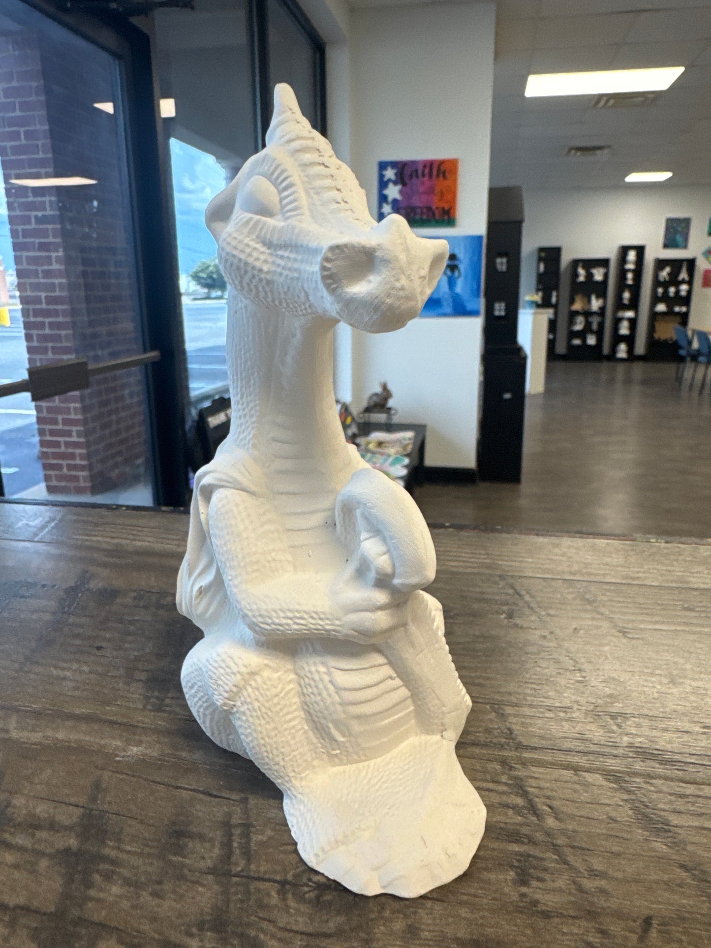 Dragon holding his tail