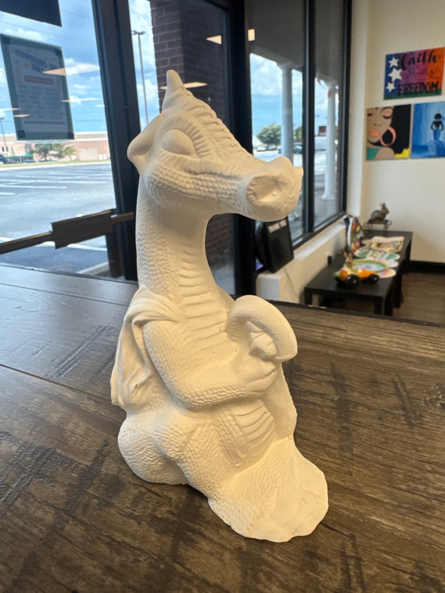 Dragon holding his tail