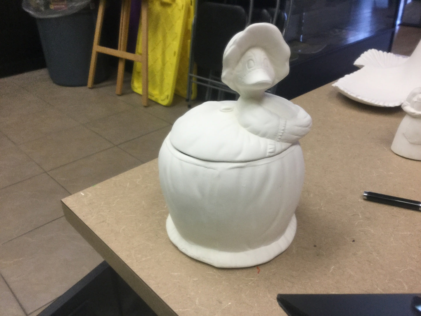 Big duck in dress box