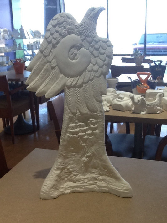Eagle statue with face of woman