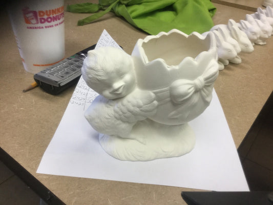 Cracked egg with chick planter