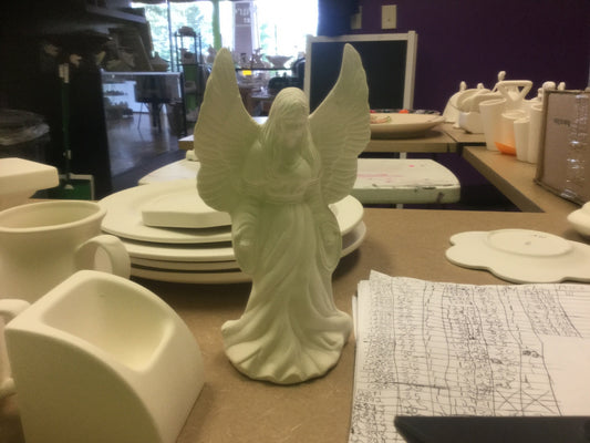 Angel with palms down