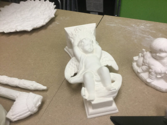 Cherub shelve