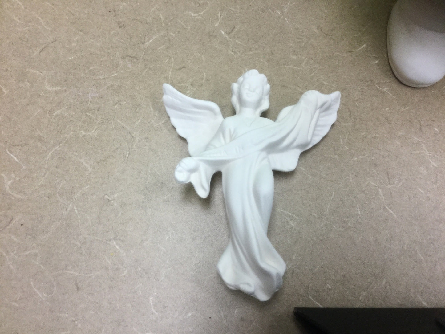 Angel with banner in Latin