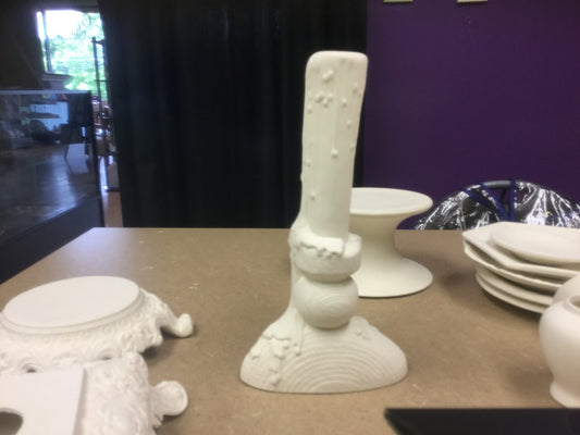 Fake candle on wooden stand