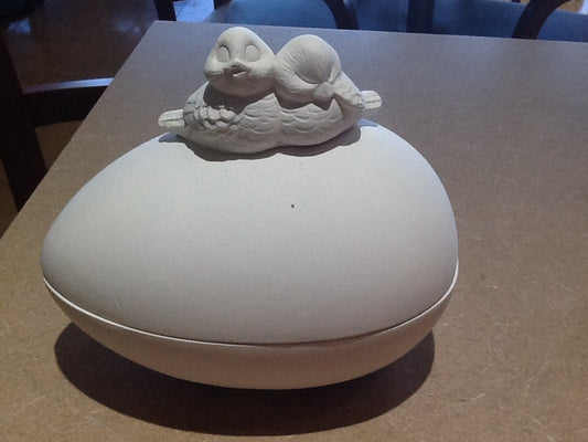 Egg box with 2 birds