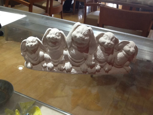 5 Rabbits On Log