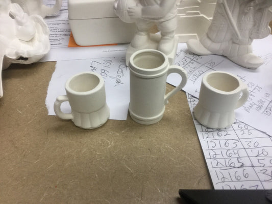 Assorted beer mug shot glasses