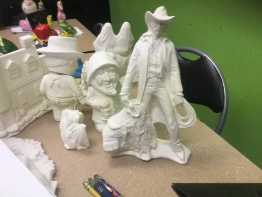 Cowboy with saddle