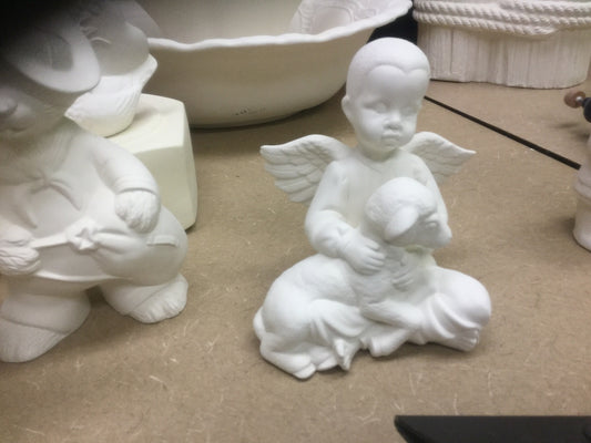 Boy angel with lamb