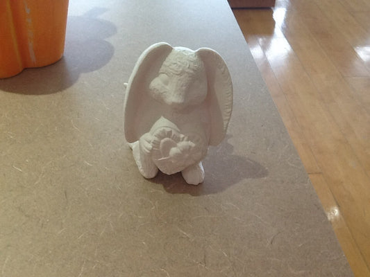 Bunny holding heart